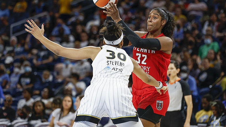 Jun 17, 2022; Chicago, Illinois, USA; Atlanta Dream forward Cheyenne Parker (32) looks to pass the ball against Chicago Sky forward Azura Stevens (30) during the first half of a WNBA game at Wintrust Arena. Mandatory Credit: Kamil Krzaczynski-USA TODAY Sports