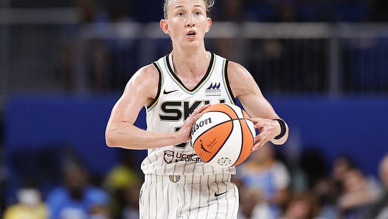 Jun 17, 2022; Chicago, Illinois, USA; Chicago Sky guard Courtney Vandersloot (22) looks to pass the ball against the Atlanta Dream during the second half of a WNBA game at Wintrust Arena. Mandatory Credit: Kamil Krzaczynski-USA TODAY Sports