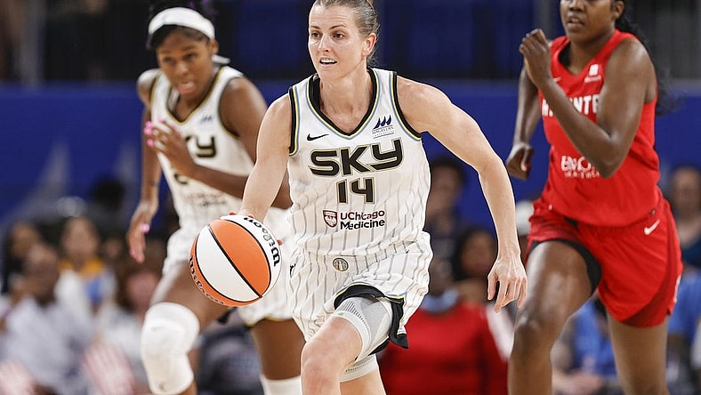 Jun 17, 2022; Chicago, Illinois, USA; Chicago Sky guard Allie Quigley (14) brings the ball up court against the Atlanta Dream during the second half of a WNBA game at Wintrust Arena. Mandatory Credit: Kamil Krzaczynski-USA TODAY Sports