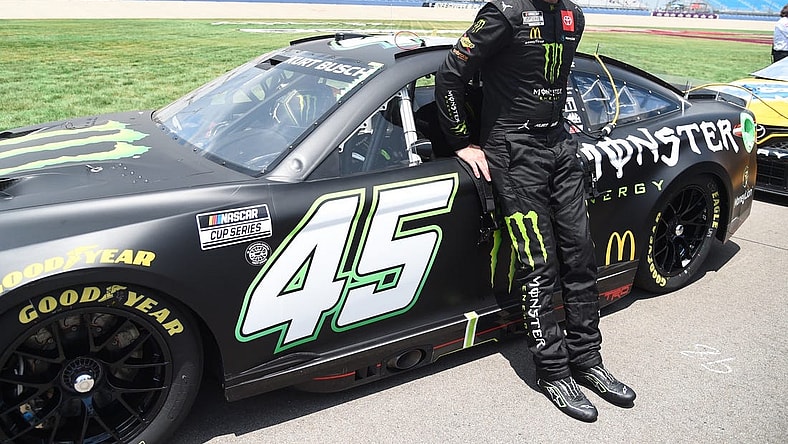 Jun 25, 2022; Nashville, Tennessee, USA; NASCAR Cup Series driver Kurt Busch (45) stands at his car during qualifying for the Ally 400 at Nashville Superspeedway. Mandatory Credit: Christopher Hanewinckel-USA TODAY Sports