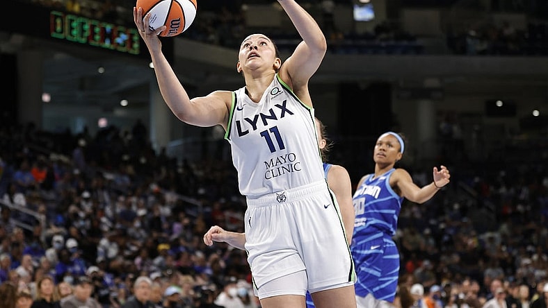 Jun 26, 2022; Chicago, Illinois, USA; Minnesota Lynx forward Natalie Achonwa (11) goes to the basket against the Chicago Sky during the second half of a WNBA game at Wintrust Arena. Mandatory Credit: Kamil Krzaczynski-USA TODAY Sports