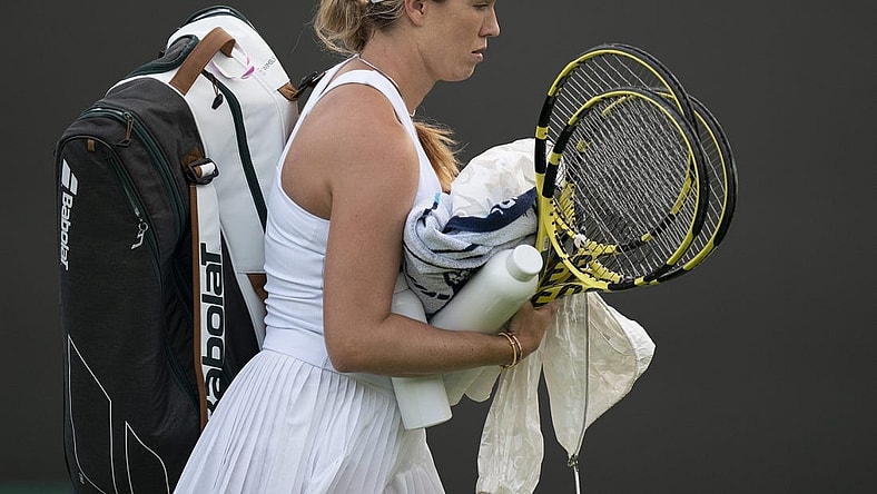 Jun 27, 2022; London, United Kingdom; Danielle Collins (USA) leaves the court after her first round match against Marie Bouzkova (CZE) on day one at All England Lawn Tennis and Croquet Club. Mandatory Credit: Susan Mullane-USA TODAY Sports