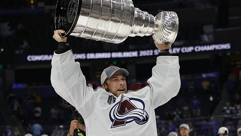 Jun 26, 2022; Tampa, Florida, USA; Colorado Avalanche goaltender Darcy Kuemper (35) celebrates with the Stanley Cup after the Avalanche game against the Tampa Bay Lightning in game six of the 2022 Stanley Cup Final at Amalie Arena. Mandatory Credit: Geoff Burke-USA TODAY Sports