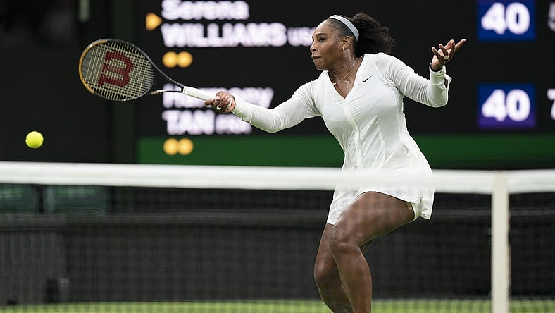 Jun 28, 2022; London, United Kingdom; Serena Williams (USA) returns a shot during her first round match against Harmony Tan (FRA) on day two at All England Lawn Tennis and Croquet Club. Mandatory Credit: Susan Mullane-USA TODAY Sports