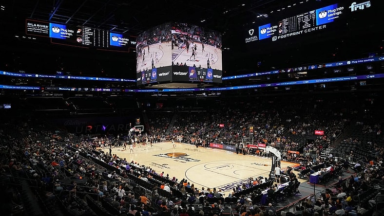 Jun 29, 2022; Phoenix, Arizona, USA; Game action between the Phoenix Mercury and the Indiana Fever during the first half at Footprint Center. Mandatory Credit: Joe Camporeale-USA TODAY Sports