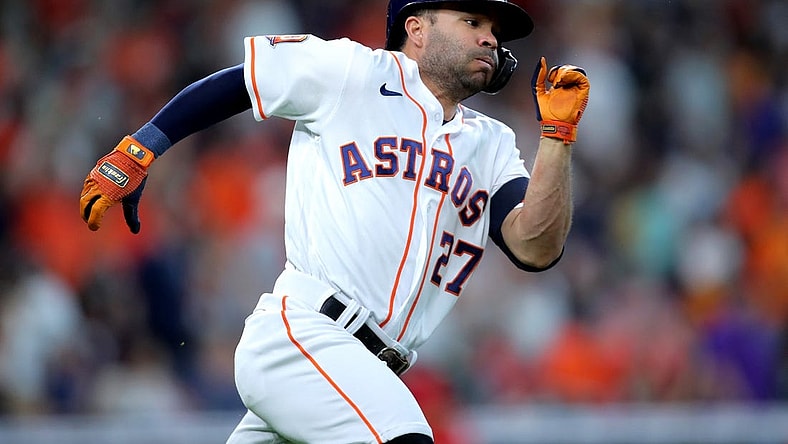 Jul 2, 2022; Houston, Texas, USA; Houston Astros second baseman Jose Altuve (27) runs up the first base line after hitting a double against the Los Angeles Angels during the first inning at Minute Maid Park. Mandatory Credit: Erik Williams-USA TODAY Sports