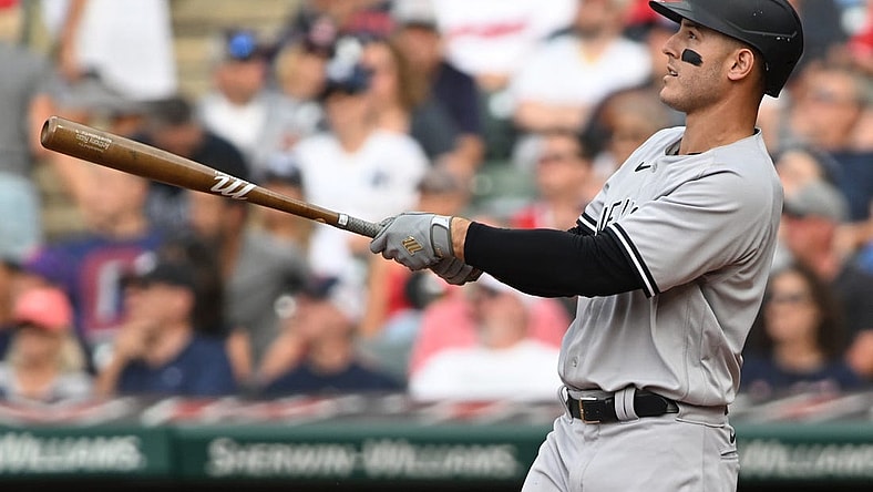 Jul 2, 2022; Cleveland, Ohio, USA; New York Yankees first baseman Anthony Rizzo (48) hits a home run during the fourth inning against the Cleveland Guardians at Progressive Field. Mandatory Credit: Ken Blaze-USA TODAY Sports