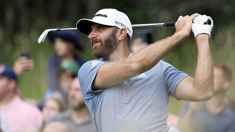 Jul 2, 2022; Portland, Oregon, USA; Dustin Johnson plays his shot from the 15th tee during the final round of the LIV Golf tournament at Pumpkin Ridge Golf Club. Mandatory Credit: Soobum Im-USA TODAY Sports