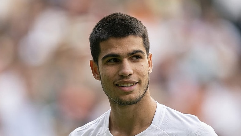 Jul 3, 2022; London, United Kingdom; Carlos Alcaraz (ESP) during his match against Jannik Sinner (ITA) on day seven at All England Lawn Tennis and Croquet Club. Mandatory Credit: Susan Mullane-USA TODAY Sports