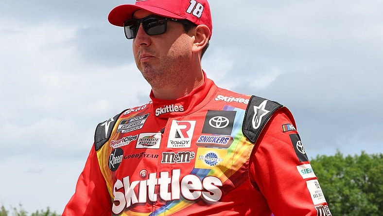 Jul 3, 2022; Elkhart Lake, Wisconsin, USA; NASCAR Cup Series driver Kyle Busch (18) before the start of the KWIK TRIP 250 at Road America. Mandatory Credit: Mike Dinovo-USA TODAY Sports