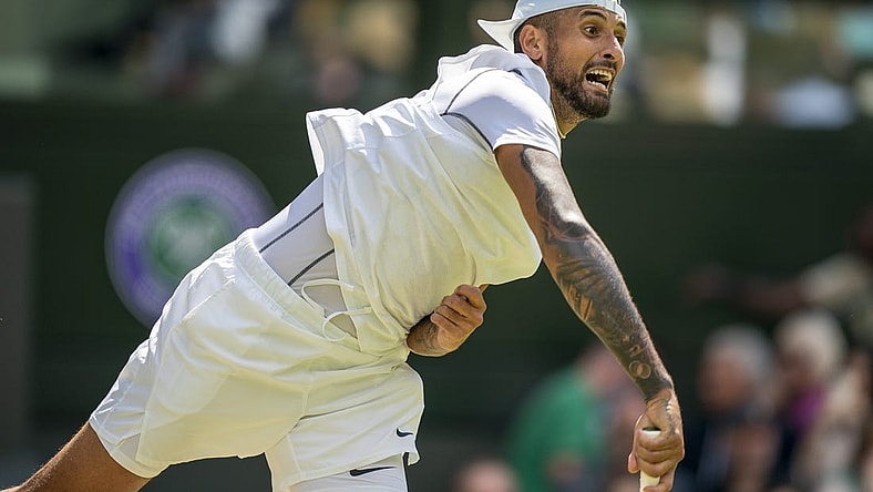 Jul 4, 2022; London, United Kingdom; Nick Kyrgios (AUS) serves during his match against Brandon Nakashima (USA) on day eight at All England Lawn Tennis and Croquet Club. Mandatory Credit: Susan Mullane-USA TODAY Sports