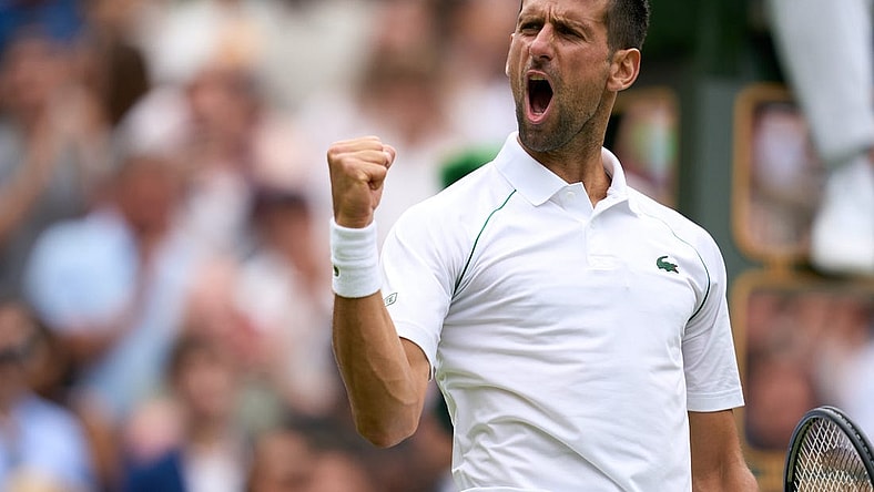 Jul 5, 2022; London, England, United Kingdom; Novak Djokovic (SRB) celebrates after match point against Jannik Sinner (ITA) during a quarterfinals mens singles match on Centre court at the 2022 Wimbledon Championships at All England Lawn Tennis and Croquet Club. Mandatory Credit: Peter van den Berg-USA TODAY Sports