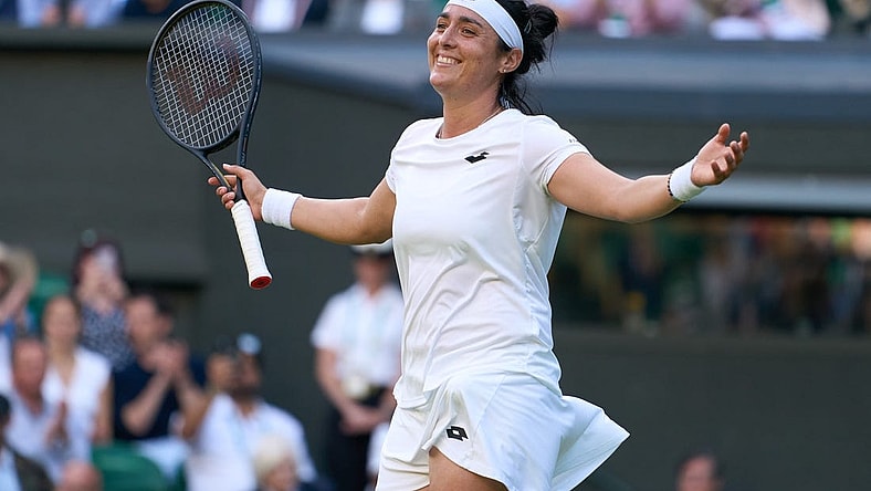 Jul 5, 2022; London, England, United Kingdom; Ons Jabeur (TUN) celebrates after match point in a quarterfinals womens singles match against Mane Bouzkova (CZE) on Centre court at the 2022 Wimbledon Championships at All England Lawn Tennis and Croquet Club. Mandatory Credit: Peter van den Berg-USA TODAY Sports