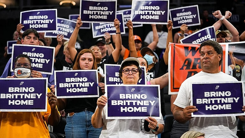 Attendees lift up their signs during a rally for Brittney Griner's release at the Footprint Center on July 6, 2022, in Phoenix.

Dsc04342
