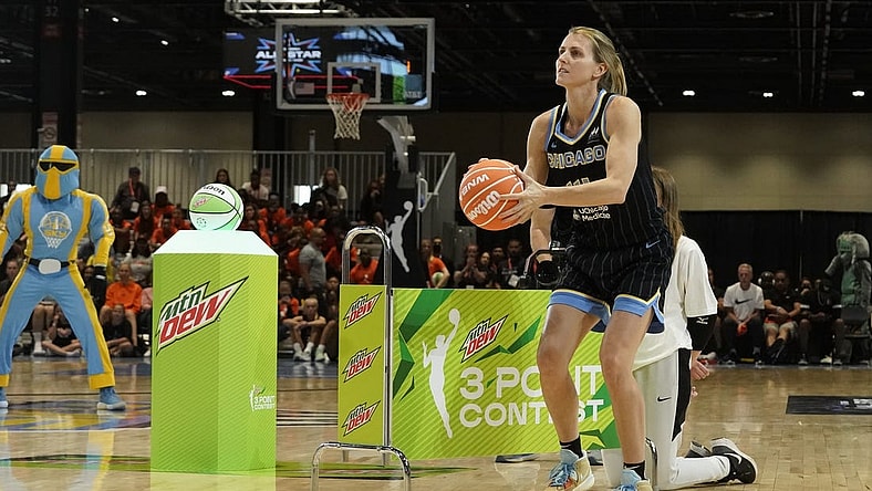 Jul 9, 2022; Chicago, Ill, USA; Allie Quigley shoots 3-point baskets during the 2022 WNBA All-Star Game skills competition at Wintrust Arena. Mandatory Credit: David Banks-USA TODAY Sports