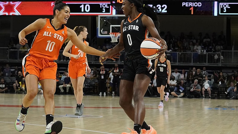 Jul 10, 2022; Chicago, Ill, USA; Team Wilson guard Kelsey Plum (10) defends Team Stewart guard Jackie Young (0) during the first half in a WNBA All Star Game at Wintrust Arena. Mandatory Credit: David Banks-USA TODAY Sports