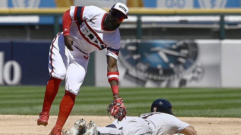 Jul 10, 2022; Chicago, Illinois, USA; Chicago White Sox second baseman Josh Harrison (5) tags out Detroit Tigers center fielder Riley Greene (31) on an attempted steal during the third inning at Guaranteed Rate Field. Mandatory Credit: Matt Marton-USA TODAY Sports