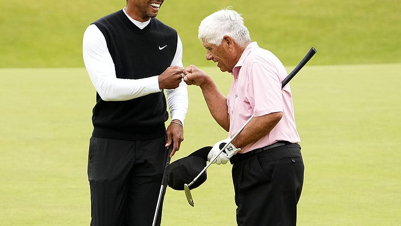 Jul 11, 2022; St. Andrews, SCT; Tiger Woods and Lee Trevino during the R&A Celebration of Champions four-hole challenge at the 150th Open Championship golf tournament at St. Andrews Old Course. Mandatory Credit: Rob Schumacher-USA TODAY Sports