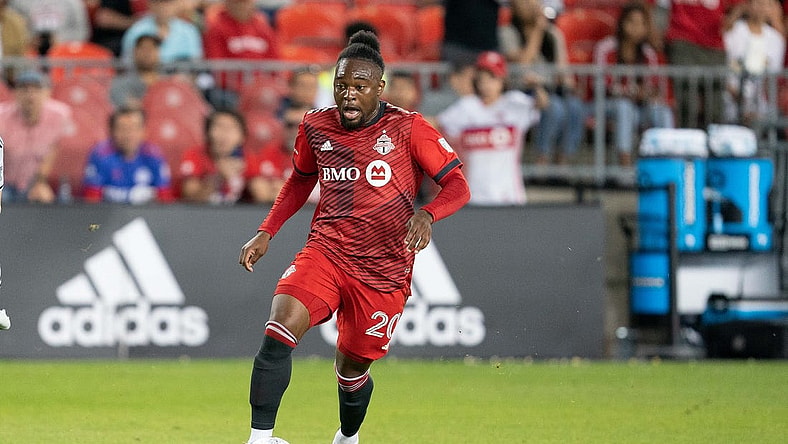 Jul 9, 2022; Toronto, Ontario, CAN; Toronto FC forward Ayo Akinola (20) controls the ball against the San Jose Earthquakes during the second half at BMO Field. Mandatory Credit: Nick Turchiaro-USA TODAY Sports