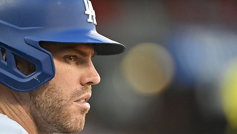 Jul 13, 2022; St. Louis, Missouri, USA;  Los Angeles Dodgers first baseman Freddie Freeman (5) looks on from the dugout before a agama against the St. Louis Cardinals at Busch Stadium. Mandatory Credit: Jeff Curry-USA TODAY Sports