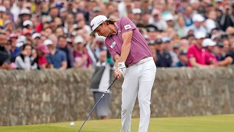Jul 17, 2022; St. Andrews, SCT; Cameron Smith tees off on the 18th hole during the final round of the 150th Open Championship golf tournament at St. Andrews Old Course. Mandatory Credit: Michael Madrid-USA TODAY Sports
