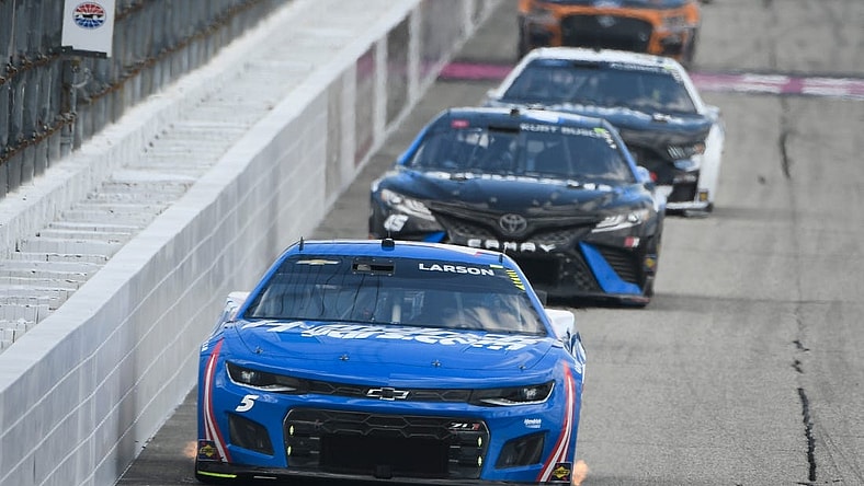 Jul 17, 2022; Loudon, New Hampshire, USA; NASCAR Cup Series driver Kyle Larson (5) races along the wall during the Ambetter 301 at New Hampshire Motor Speedway. Mandatory Credit: Eric Canha-USA TODAY Sports