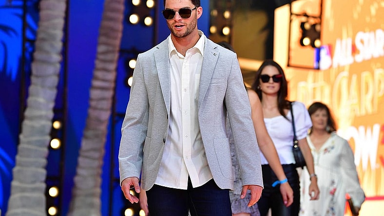 Jul 19, 2022; Los Angeles, CA, USA; American League outfielder Andrew Benintendi (16) of the Kansas City Royals during the Red Carpet Show at L.A. Live. Mandatory Credit: Gary A. Vasquez-USA TODAY Sports