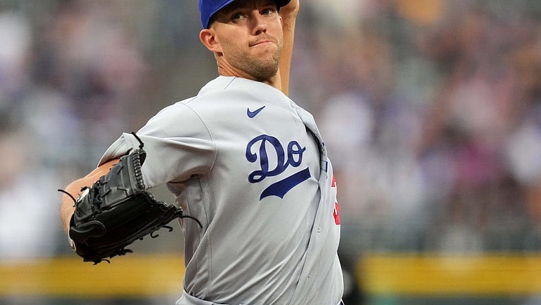 Jul 28, 2022; Denver, Colorado, USA; Los Angeles Dodgers starting pitcher Tyler Anderson (31) delivers a pitch in the first inning against the Colorado Rockies at Coors Field. Mandatory Credit: Ron Chenoy-USA TODAY Sports