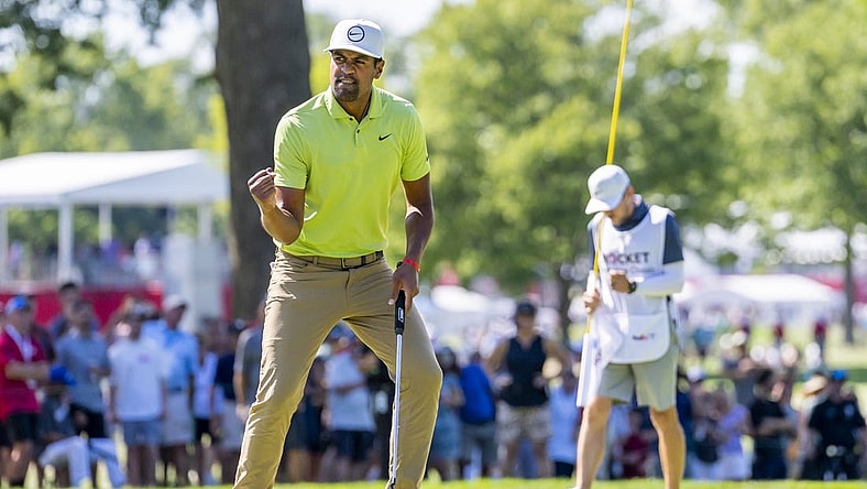 Jul 31, 2022; Detroit, Michigan, USA; Tony Finau pumps his fist after making birdie on the par 4 twelfth hole during the final round of the Rocket Mortgage Classic golf tournament. Mandatory Credit: Raj Mehta-USA TODAY Sports