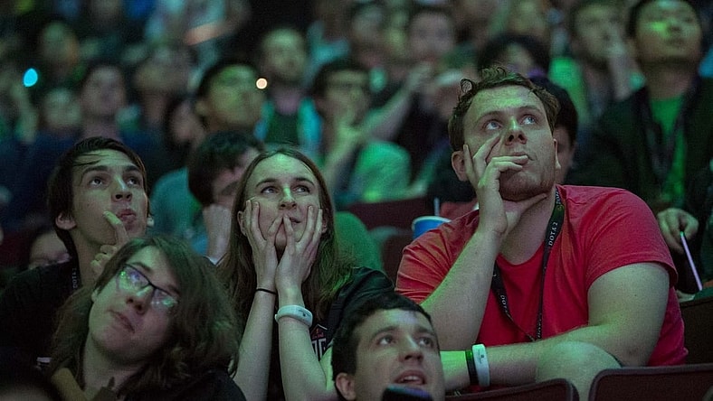 Aug 25, 2018; Vancouver, British Columbia, CAN; Fans watch as Team OG plays Team LGD in the Grand Final of the International Dota 2 Championships at Rogers Arena in Vancouver. The championships are eSports largest annual tournament with approximately $25 million U.S. in prize money to be awarded. Dota 2 is a free 10-player online video game with two teams of players from all over the world competing against one another in each game. Mandatory Credit: Bob Frid-USA TODAY Sports