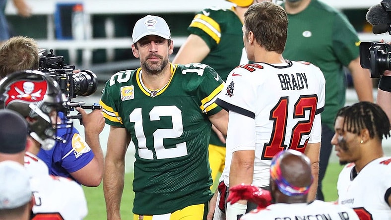 Oct 18, 2020; Tampa, Florida, USA; Tampa Bay Buccaneers quarterback Tom Brady (right) greets Green Bay Packers quarterback Aaron Rodgers (left) after a NFL game at Raymond James Stadium. Mandatory Credit: Kim Klement-USA TODAY Sports