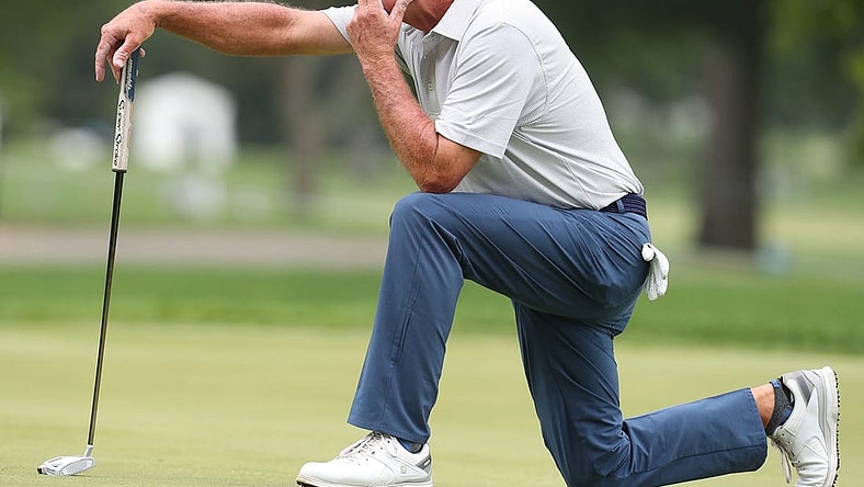 Fred Funk waits to putt on the second green during the second round of the Bridgestone Senior Players Championship at Firestone Country Club on Friday June 25, 2021 in Akron.

Bridge 626 Mc 3