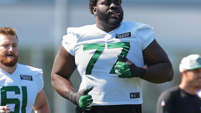 Jul 31, 2021; Florham Park, NJ, USA; New York Jets offensive tackle Mekhi Becton (77) runs during training camp at Atlantic Health Jets Training Center. Mandatory Credit: Vincent Carchietta-USA TODAY Sports