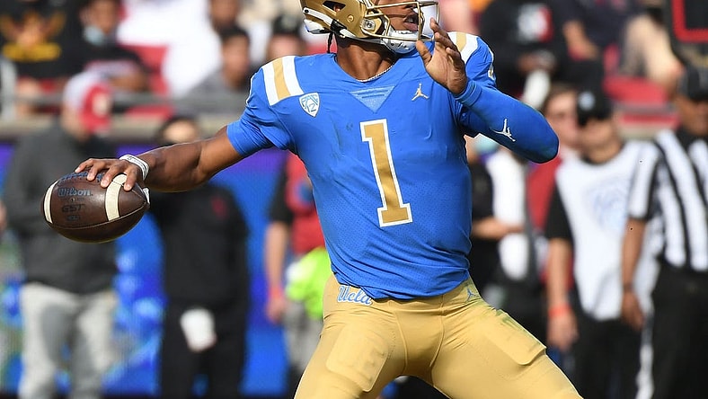 Nov 20, 2021; Los Angeles, California, USA; UCLA Bruins quarterback Dorian Thompson-Robinson (1) throws a pass against the Southern California Trojans in the first half at the Los Angeles Memorial Coliseum. Mandatory Credit: Richard Mackson-USA TODAY Sports