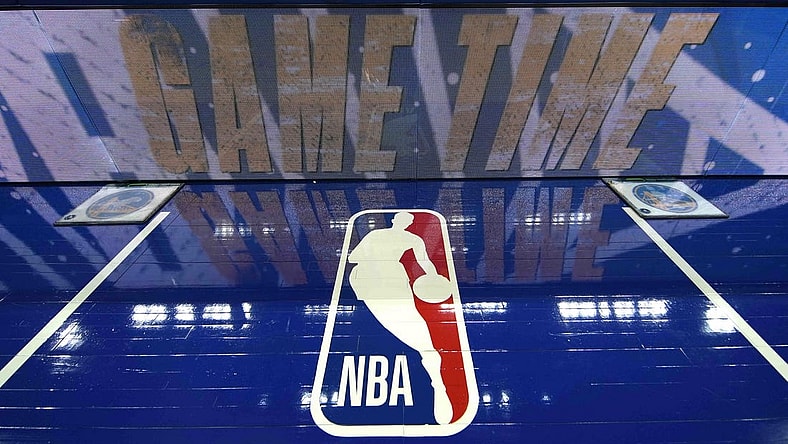 Mar 12, 2022; San Francisco, California, USA; A view of the NBA logo painted on the sideline before the game between the Golden State Warriors and the Milwaukee Bucks at Chase Center. Mandatory Credit: Darren Yamashita-USA TODAY Sports
