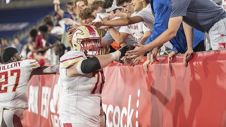 Apr 30, 2022; Birmingham, AL, USA; Birmingham Stallions offensive lineman Cameron Hunt (78) celebrates a win over the New Orleans Breakers with the fans at Protective Stadium. Mandatory Credit: Vasha Hunt-USA TODAY Sports