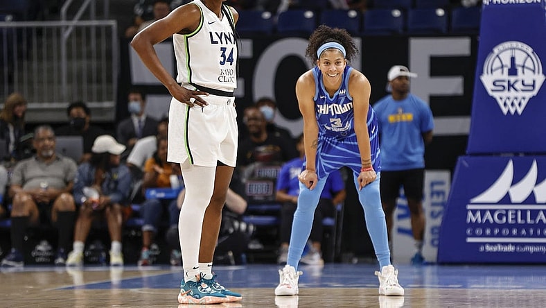 Jun 26, 2022; Chicago, Illinois, USA; Chicago Sky forward Candace Parker (3) stands next to Minnesota Lynx center Sylvia Fowles (34) during the first half at Wintrust Arena. Mandatory Credit: Kamil Krzaczynski-USA TODAY Sports