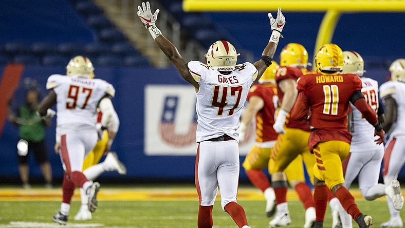Jul 3, 2022; Canton, OH, USA; Birmingham Stallions outside linebacker DeMarquis Gates (47) celebrates an interception and touchdown against the Philadelphia Stars during the fourth quarter at Tom Benson Hall of Fame Stadium. Mandatory Credit: Scott Galvin-USA TODAY Sports