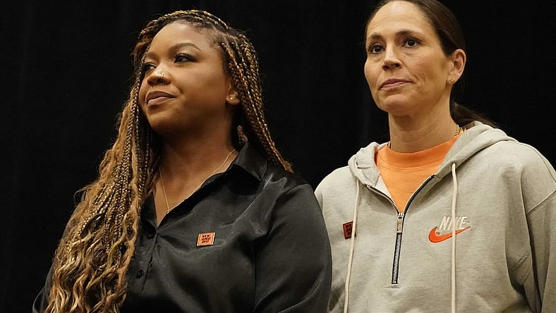 Jul 8, 2022; Chicago, IL, USA; Cherelle Griner (left) spouse of Brittney Griner  and Sue Bird during a press conference  addressing the detention of Brittney Griner in Russia at Hyatt Regency at McCormick Place. Mandatory Credit: David Banks-USA TODAY Sports