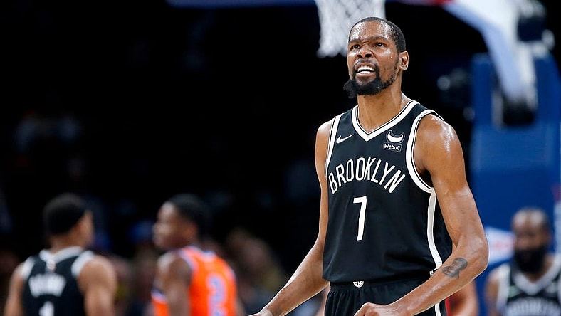 Nets forward Kevin Durant (7) reacts after a play against the Thunder during Brooklyn's 120-96 win on Nov. 14, 2021, at Paycom Center.

cutout