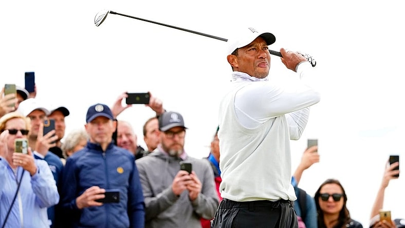 Jul 15, 2022; St. Andrews, SCT; Tiger Woods tees off on the seventh hole during the second round of the 150th Open Championship golf tournament at St. Andrews Old Course. Mandatory Credit: Rob Schumacher-USA TODAY Sports