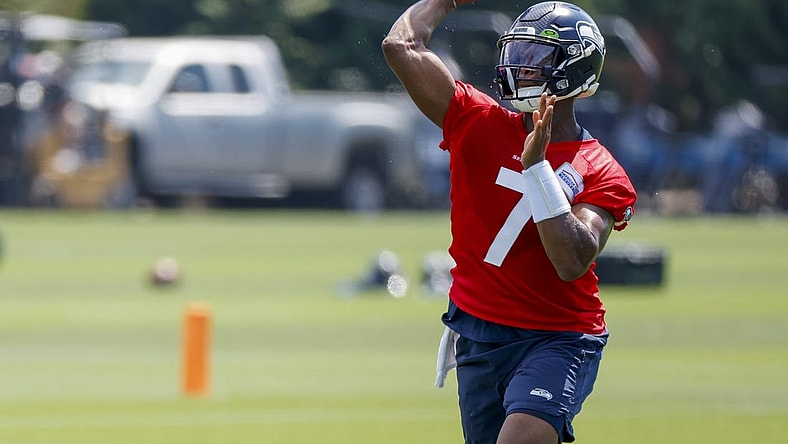 Jul 27, 2022; Renton, WA, USA; Seattle Seahawks quarterback Geno Smith (7) passes during training camp practice at Virginia Mason Athletic Center. Mandatory Credit: Joe Nicholson-USA TODAY Sports