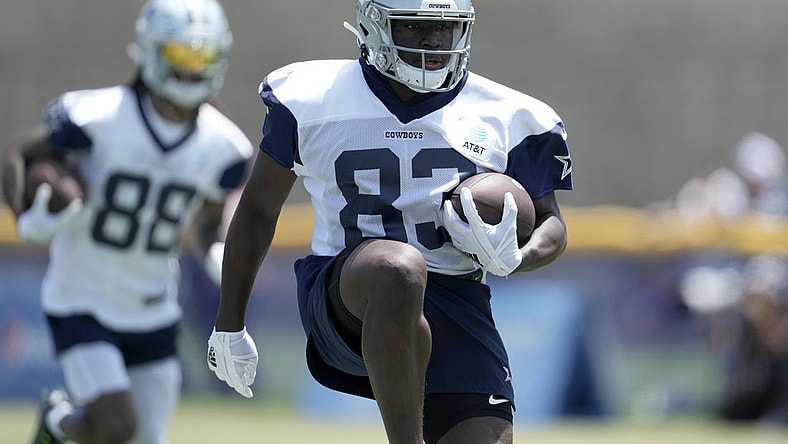 Jul 27, 2022; Oxnard, CA, USA; Dallas Cowboys receiver James Washington (83) carries the ball during training camp at the River Ridge Fields. Mandatory Credit: Kirby Lee-USA TODAY Sports