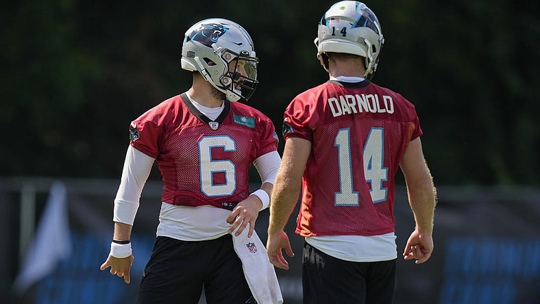 Jul 28, 2022; Spartanburg, SC, USA; Carolina Panthers quarterback Baker Mayfield (6) and quarterback Sam Darnold (14) during the third day of training camp at Wofford College. Mandatory Credit: Jim Dedmon-USA TODAY Sports
