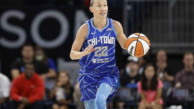 Jul 29, 2022; Chicago, Illinois, USA; Chicago Sky guard Courtney Vandersloot (22) brings the ball up court during the first half of the WNBA game against the New York Liberty at Wintrust Arena. Mandatory Credit: Kamil Krzaczynski-USA TODAY Sports