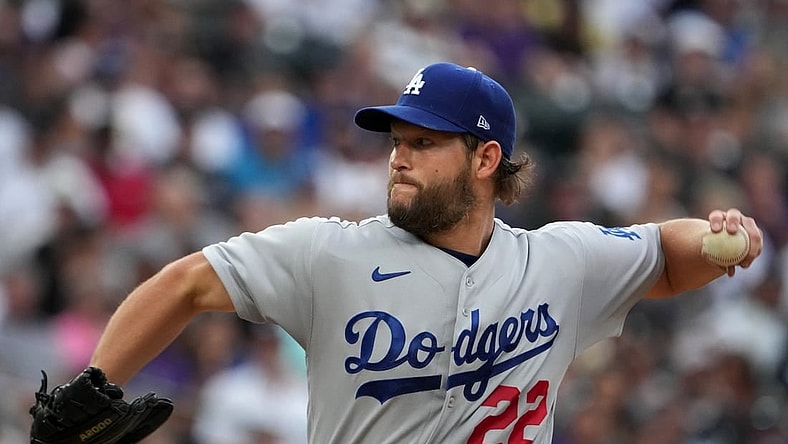 Jul 30, 2022; Denver, Colorado, USA; Los Angeles Dodgers starting pitcher Clayton Kershaw (22) delivers against the Colorado Rockies the fourth inning at Coors Field. Mandatory Credit: Ron Chenoy-USA TODAY Sports