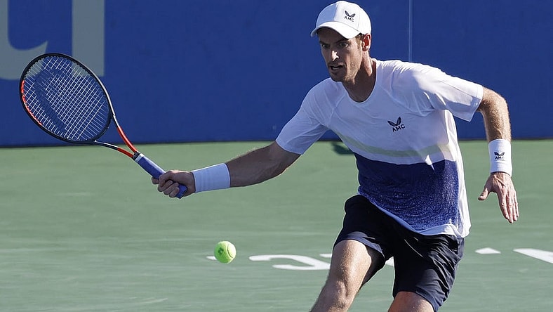 Aug 1, 2022; Washington, DC, USA; Andy Murray (GBR) hits a forehand against Mikael Ymer (SUI) (not pictured) on day one of the Citi Open at Rock Creek Park Tennis Center. Mandatory Credit: Geoff Burke-USA TODAY Sports