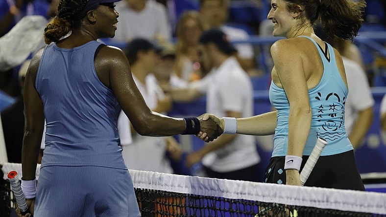 Aug 1, 2022; Washington, DC, USA; Venus Williams (USA) (L) shakes hands with Rebecca Marino (CAN) (R) after their match on day one of the Citi Open at Rock Creek Park Tennis Center. Mandatory Credit: Geoff Burke-USA TODAY Sports