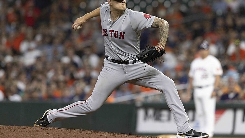 Aug 2, 2022; Houston, Texas, USA;  Boston Red Sox relief pitcher Tanner Houck (89) pitches against the Houston Astros in the eighth inning at Minute Maid Park. Mandatory Credit: Thomas Shea-USA TODAY Sports