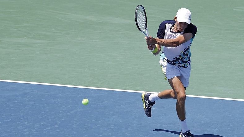 Aug 3, 2022; Washington, DC, USA; Emil Ruusuvuori (FIN) hits a backhand against Hubert Hurkacz (POL) (not pictured) on day three of the Citi Open at Rock Creek Park Tennis Center. Mandatory Credit: Geoff Burke-USA TODAY Sports